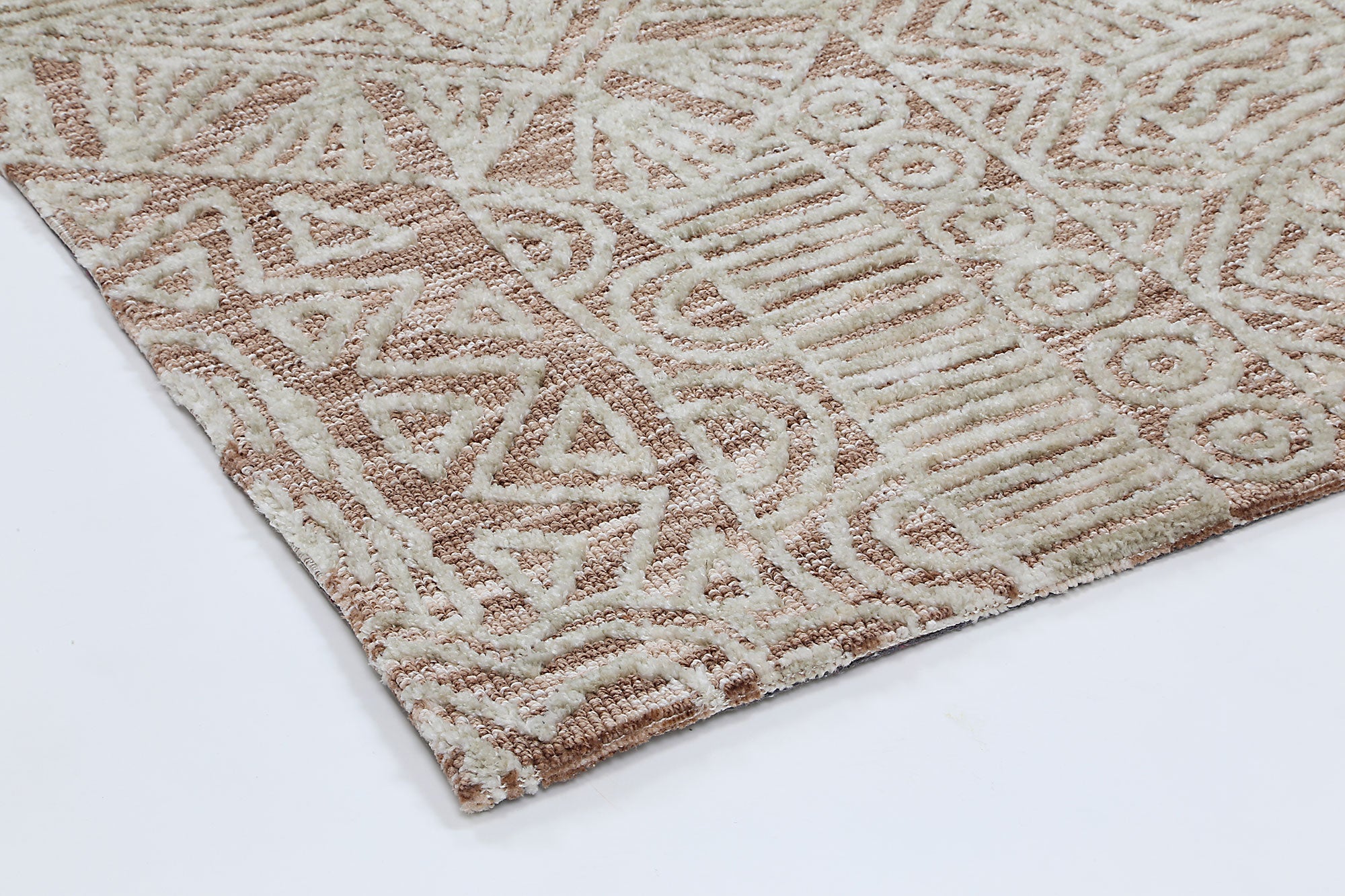 Alayah Rust Flower Rug 160x230 cm featuring geometric patterns in warm rust and cream colors, hand-tufted wool texture.