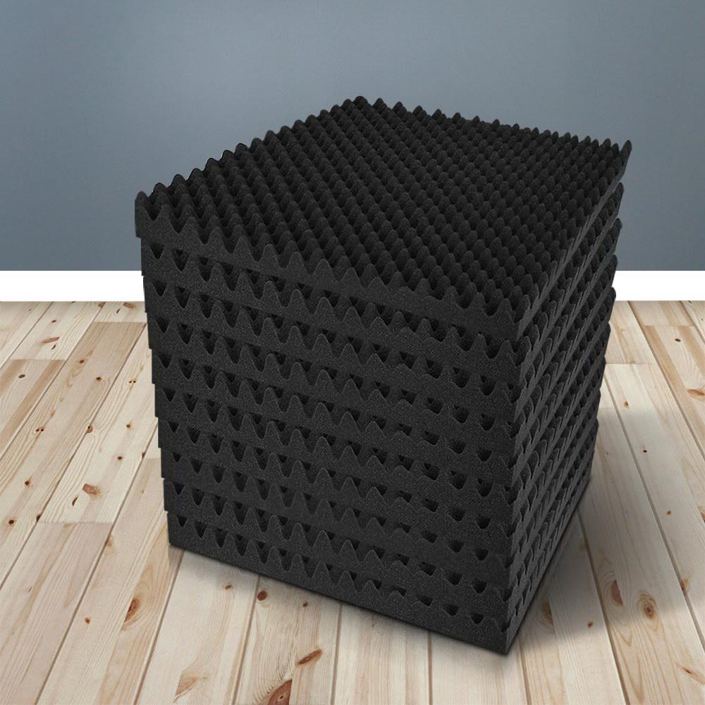 A set of 20 black eggshell acoustic foam panels arranged for sound absorption in a studio setting.