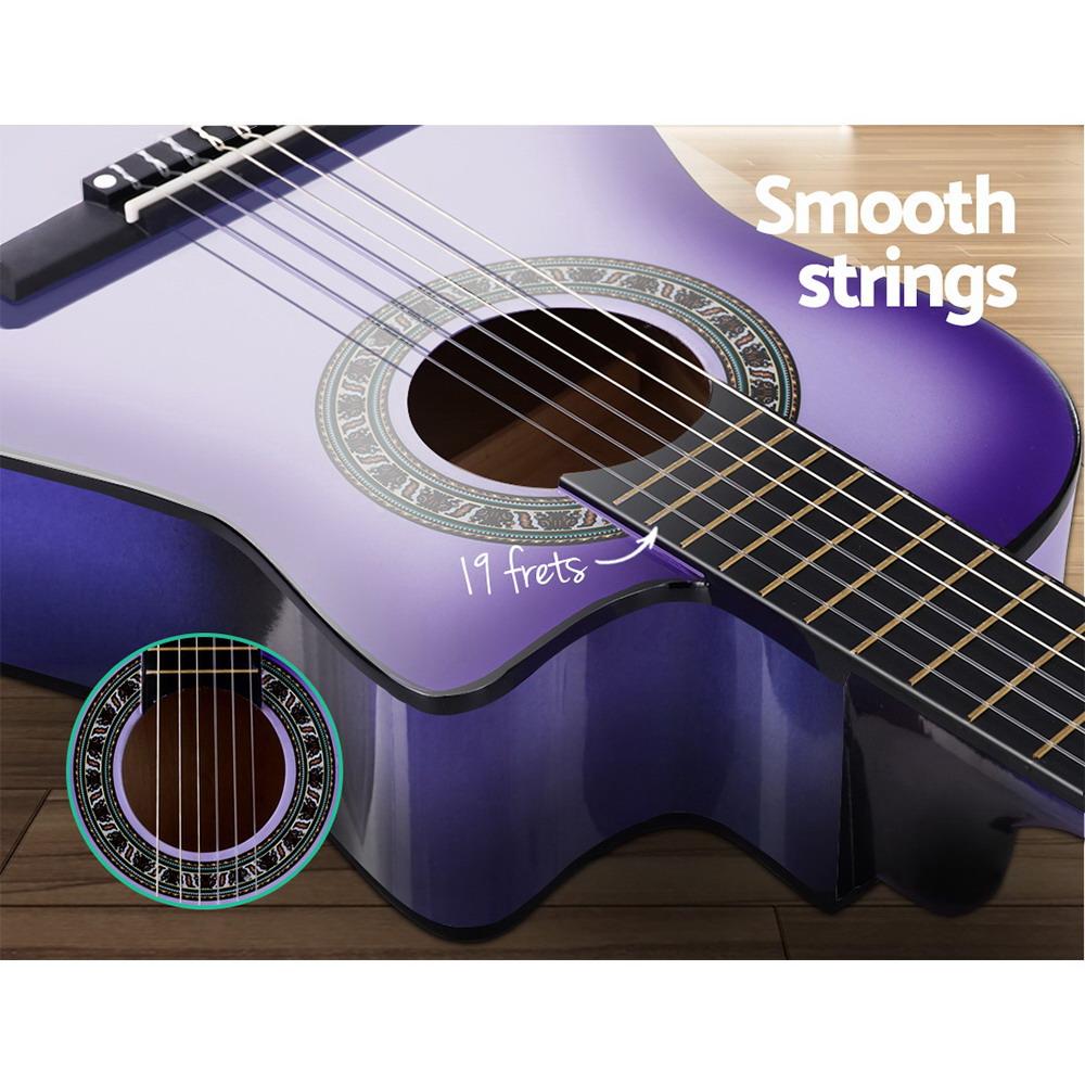 Alpha 34-inch Classical Acoustic Guitar in purple with accessories including picks, tuner, and carry bag.