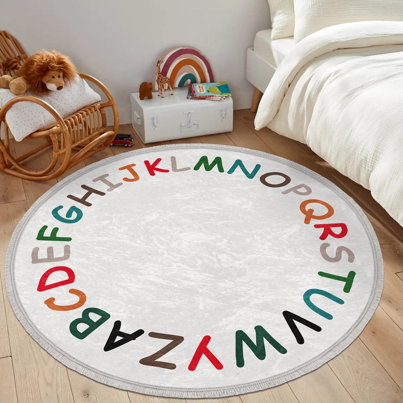 Colorful Alphabet Design Round Rug for Kids Room, featuring soft velvet fabric and fringes, perfect for nursery decor.