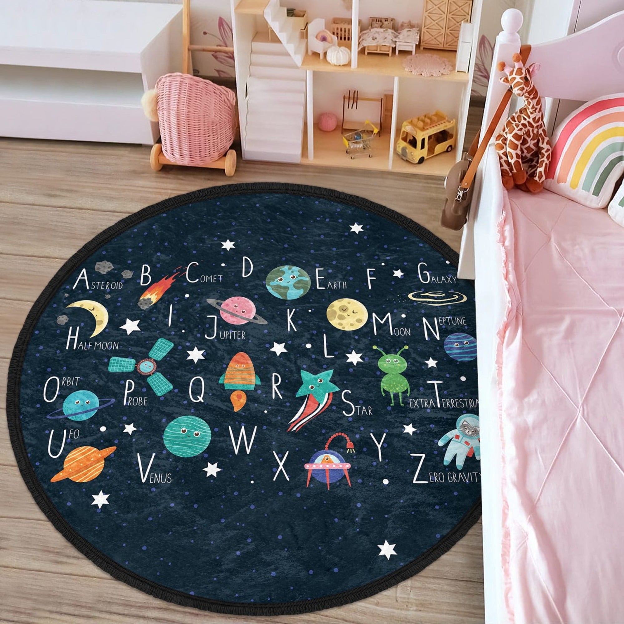 Colorful round area rug featuring alphabet letters and space design, perfect for kids' rooms and nurseries.