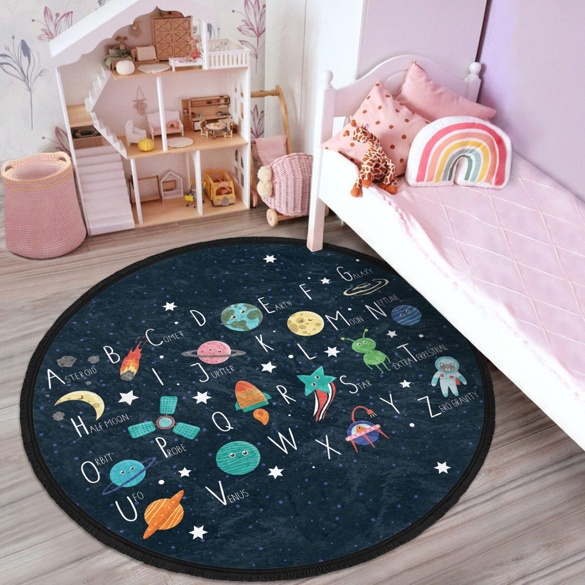 Colorful round area rug featuring alphabet letters and space design, perfect for kids' rooms and nurseries.