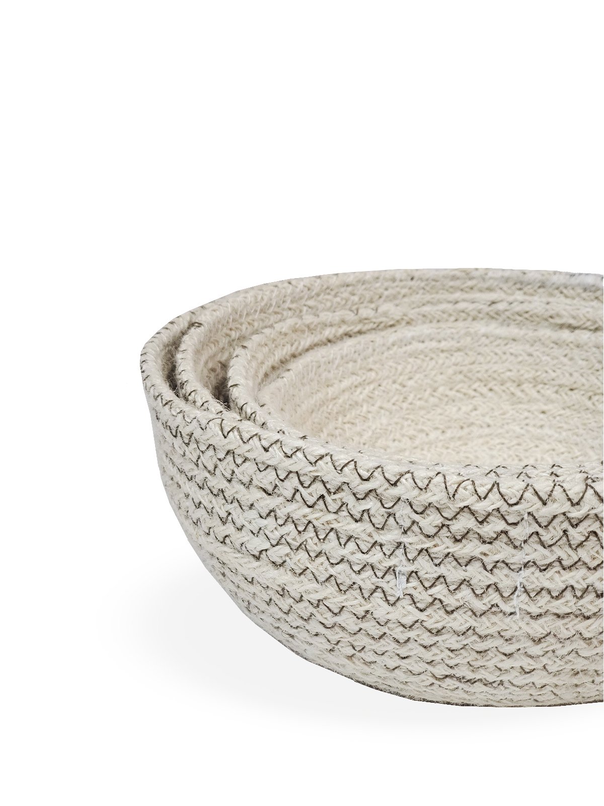 Set of four Amari Round Bowls in off-white with brown stitching, showcasing their handcrafted design and various sizes.