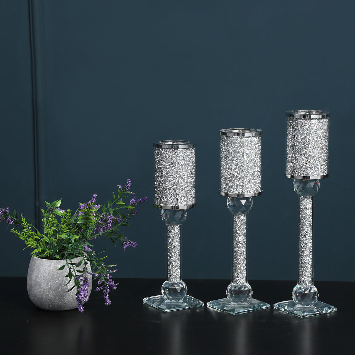 Ambrose 3 Candles Holder Set featuring silver crushed diamonds glass, showcasing three elegant candle holders in varying heights.