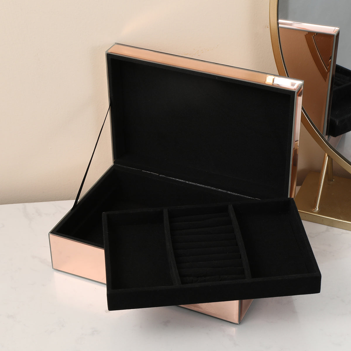 Ambrose Exquisite Rose Gold Glass Jewelry Box with dividers, elegantly designed for jewelry organization.