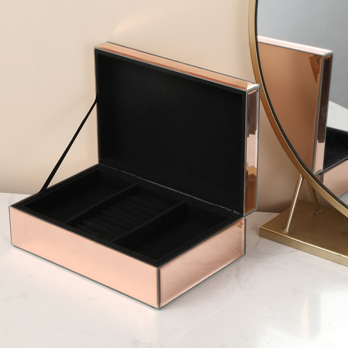 Ambrose Exquisite Rose Gold Glass Jewelry Box with dividers, elegantly designed for jewelry organization.