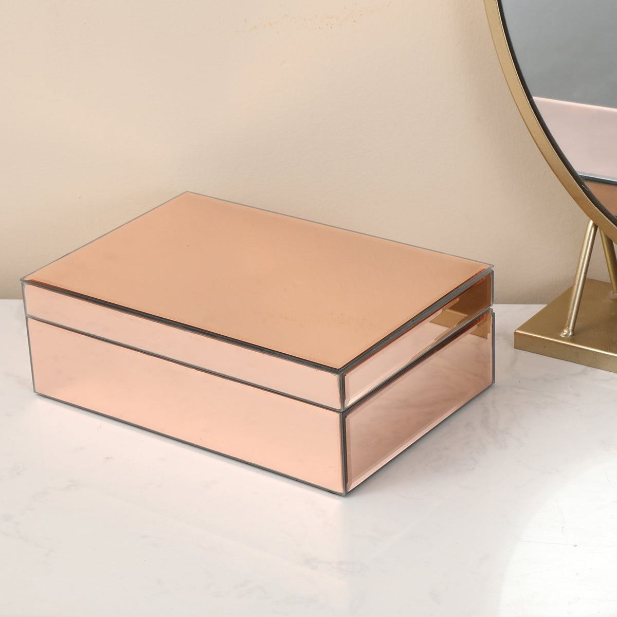 Ambrose Exquisite Rose Gold Glass Jewelry Box with dividers, elegantly designed for jewelry organization.