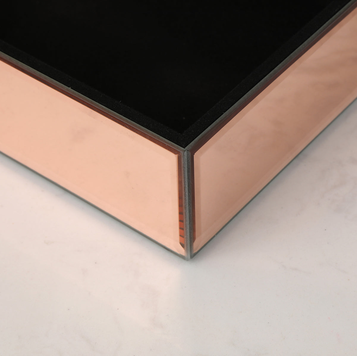 Ambrose Exquisite Rose Gold Glass Jewelry Box with dividers, elegantly designed for jewelry organization.