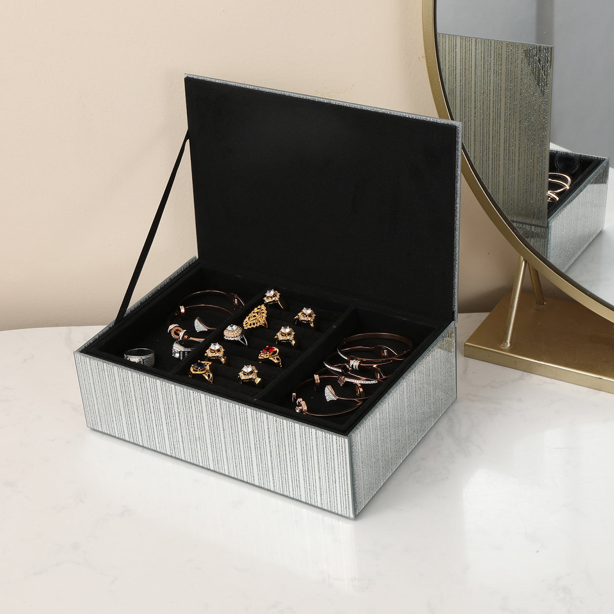 Ambrose Exquisite Silver Striped Glass Jewelry Box with elegant design and crystal embellishments, showcasing organized jewelry storage.