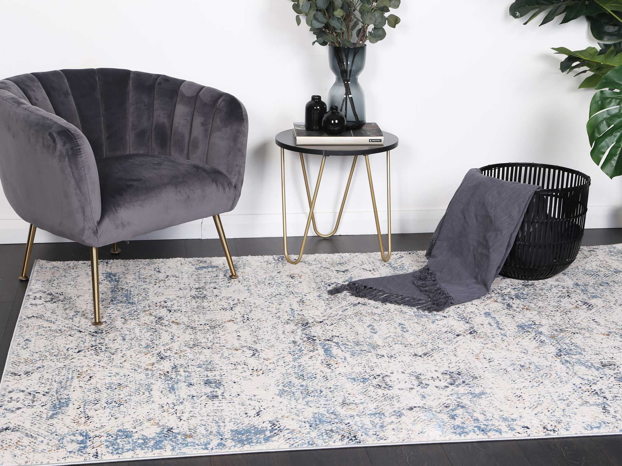 Amelia Navy Blue Ikat Rug measuring 160x230 cm, featuring elegant abstract patterns and a soft texture, perfect for enhancing home decor.