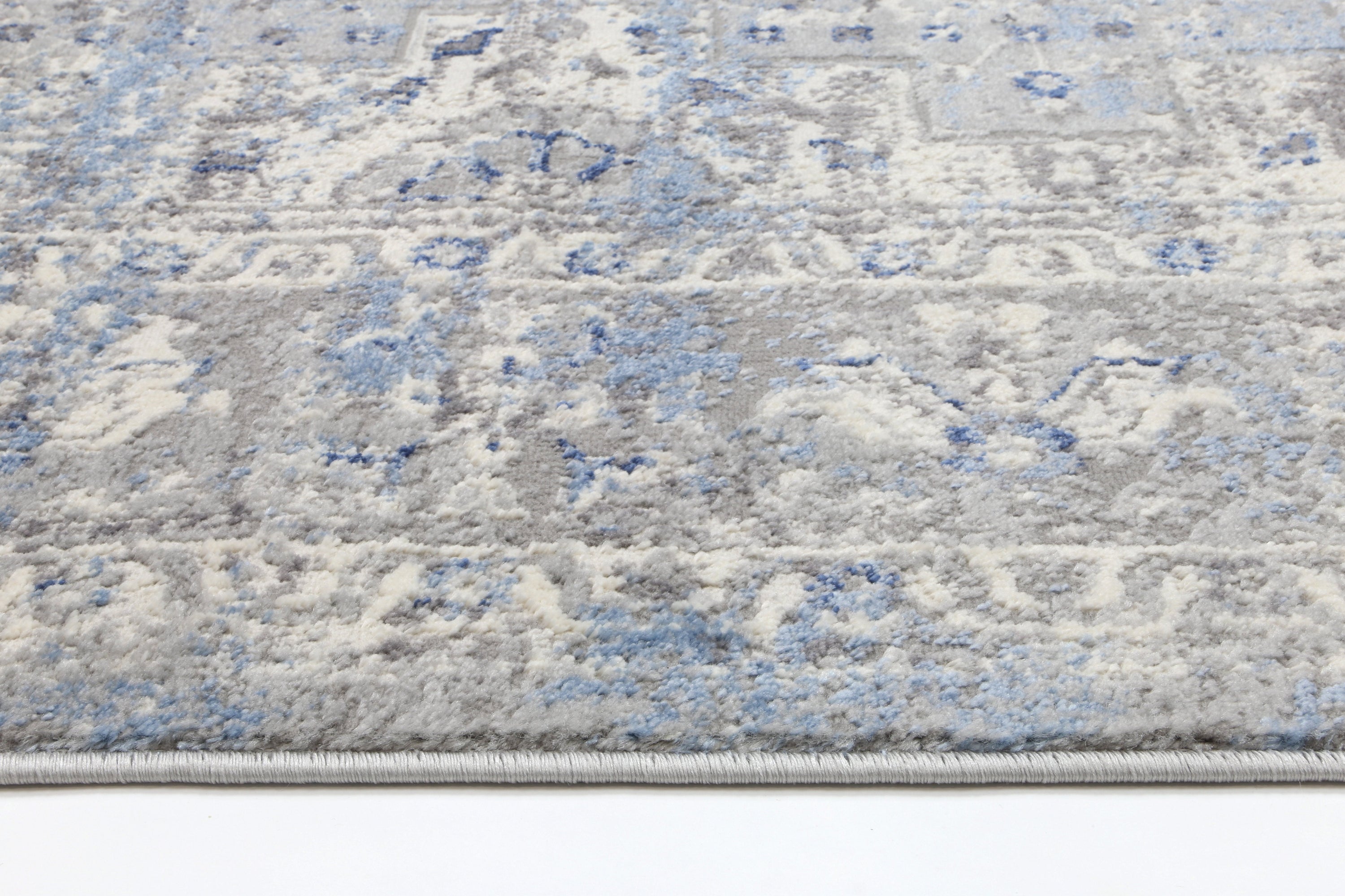 Amelia Navy Blue Oriental Rug measuring 240x330 cm with abstract motifs, perfect for enhancing home decor.