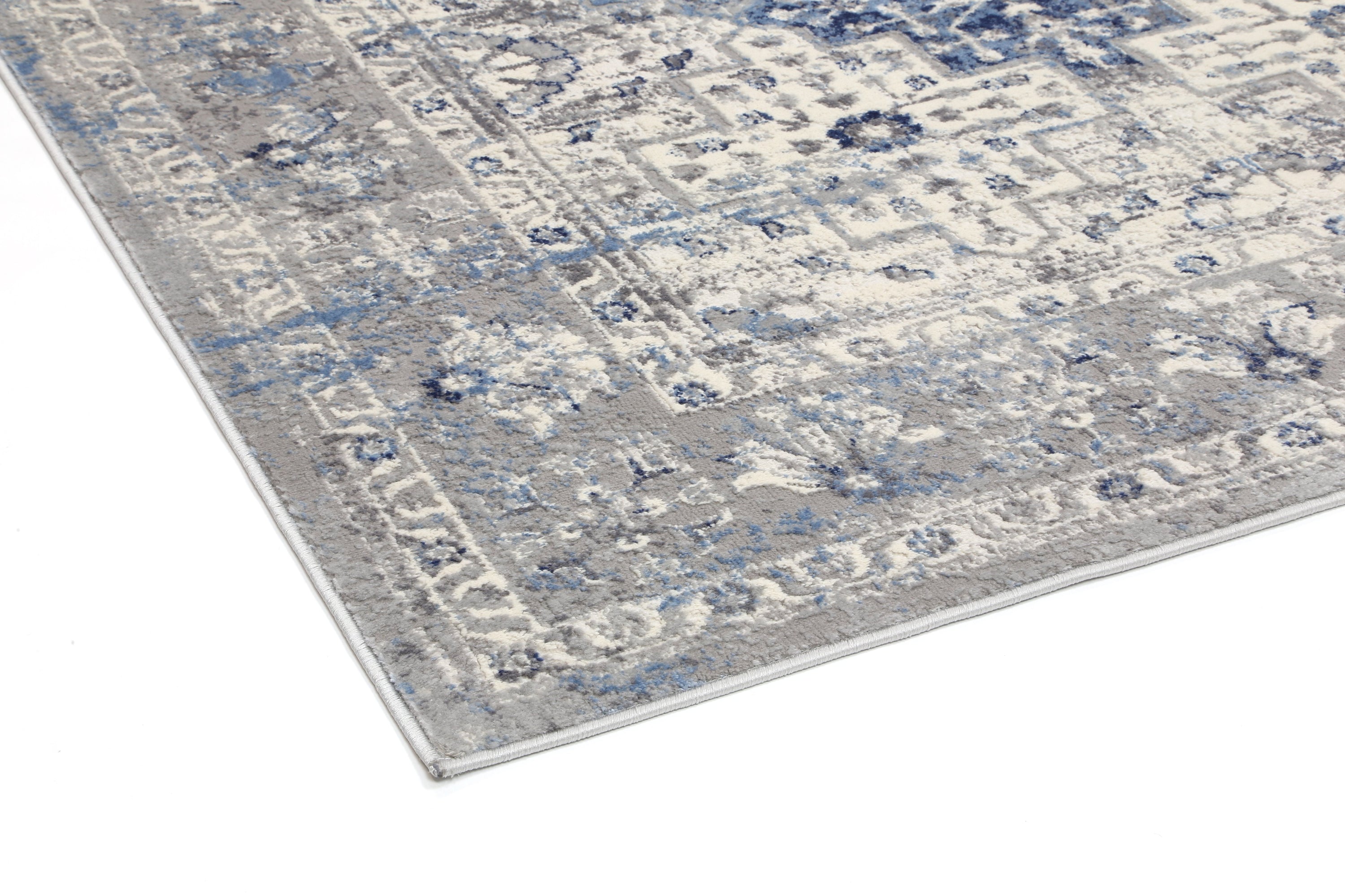 Amelia Navy Blue Oriental Rug measuring 240x330 cm with abstract motifs, perfect for enhancing home decor.