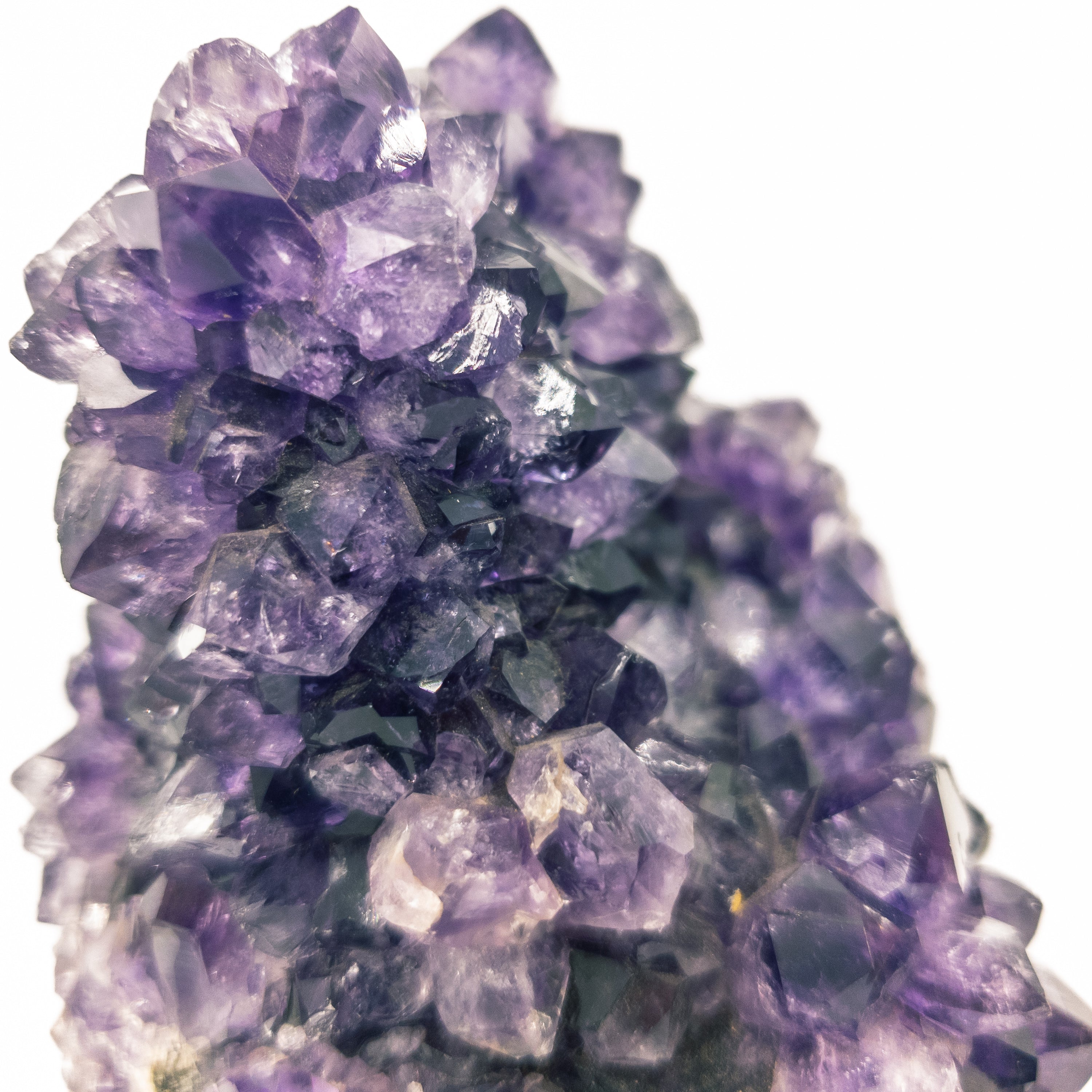 A beautiful grade A amethyst flower cluster with druzy crystals on all sides, measuring 3 inches by 3 inches, sourced from Brazil.