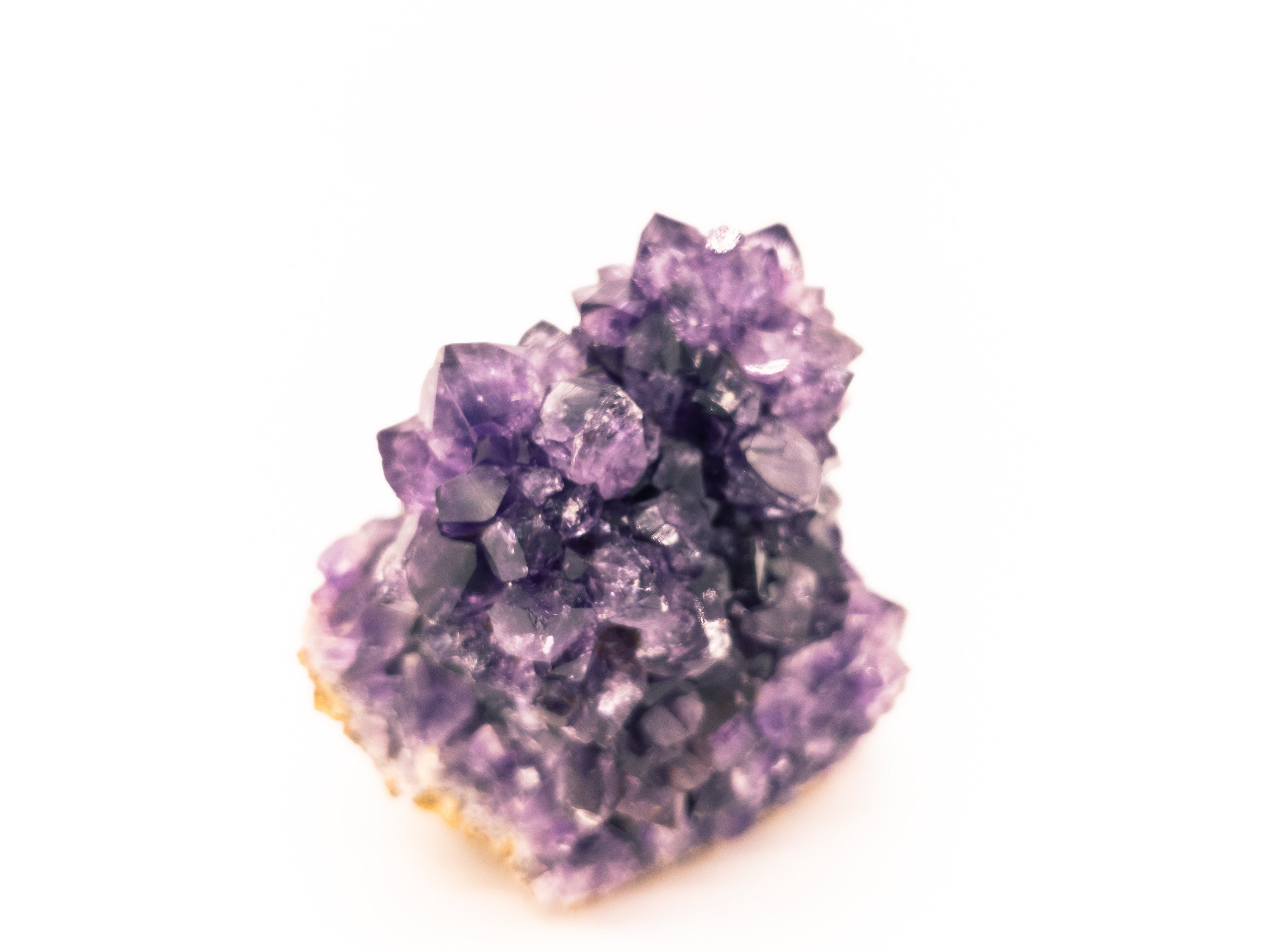 A beautiful grade A amethyst flower cluster with druzy crystals on all sides, measuring 3 inches by 3 inches, sourced from Brazil.