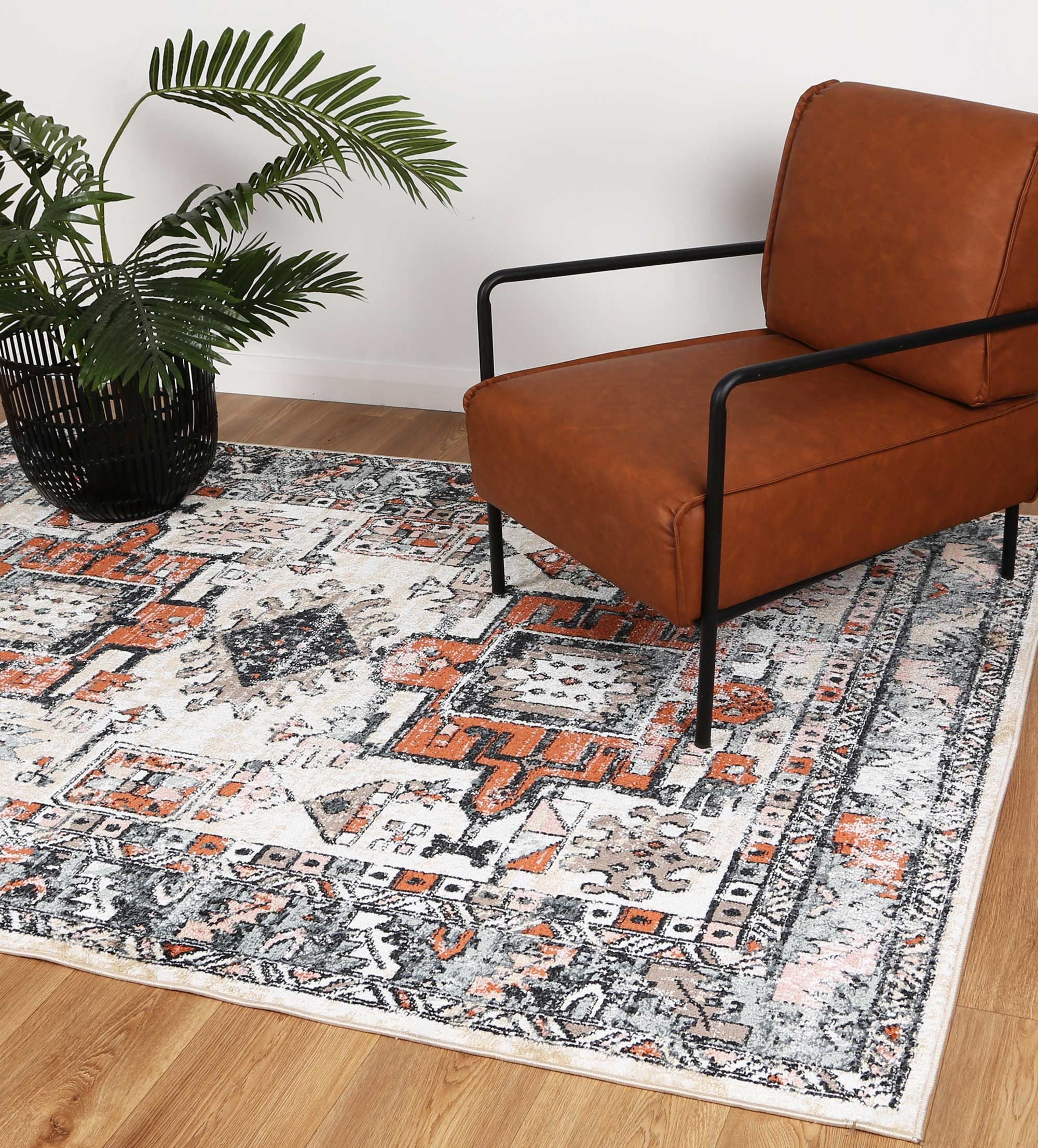 Anatolia Traditional Black Cream Rug 160x230cm showcasing intricate patterns in black, grey, cream, and terracotta colors, perfect for enhancing home decor.