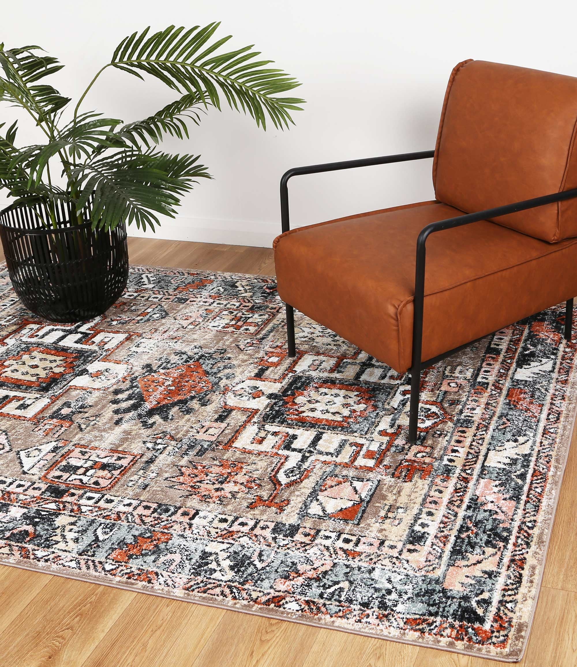 Anatolia Traditional Multi Rug 160x230cm showcasing an antique design with a color palette of black, grey, cream, and terracotta, perfect for home decor.