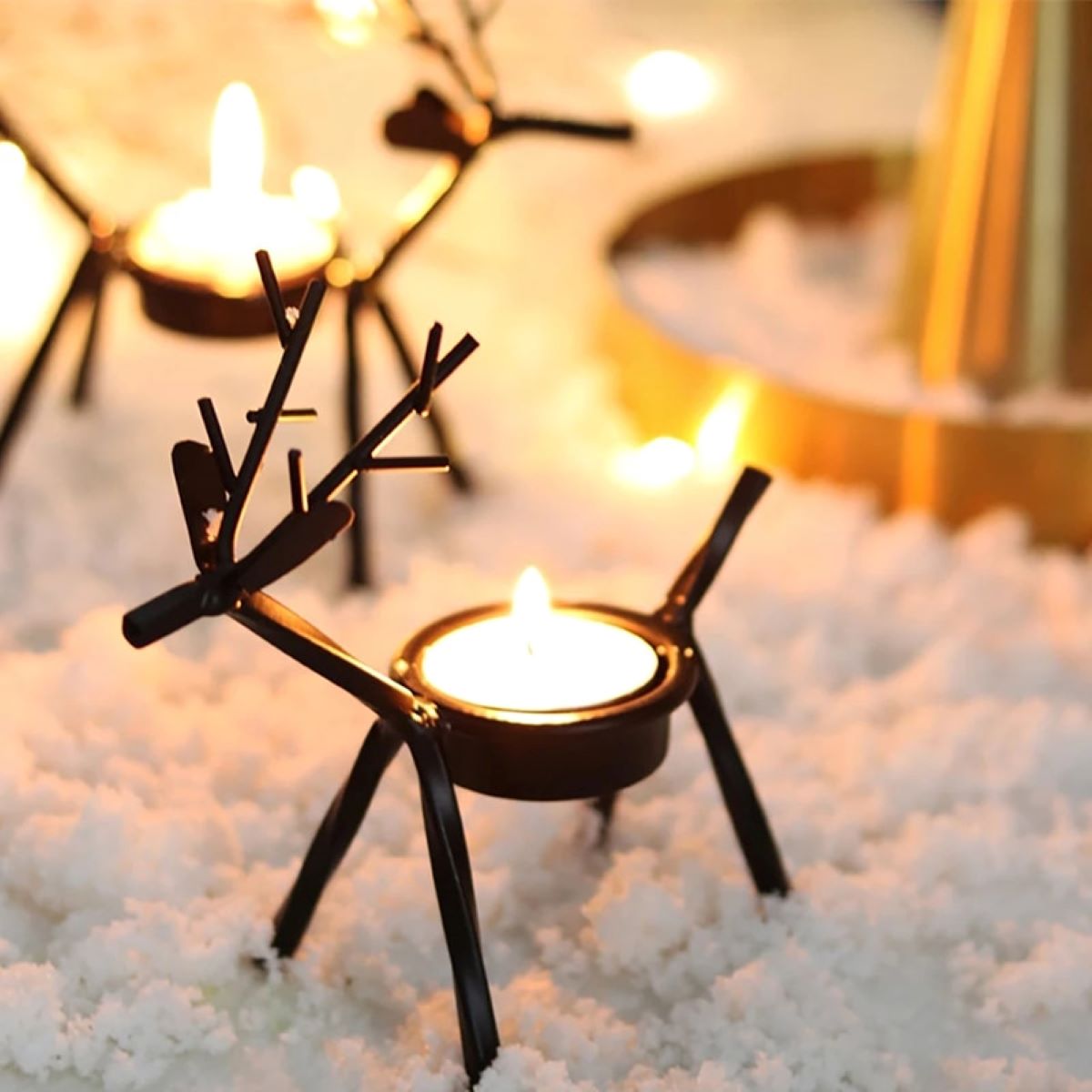 Antelope Stick Candle Holder made of wrought iron, featuring an elegant antelope design, perfect for T candles and table decor.