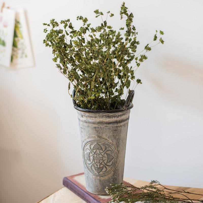 Antique Floral Carving Iron Flower Pot in gray with intricate floral designs, available in three sizes.