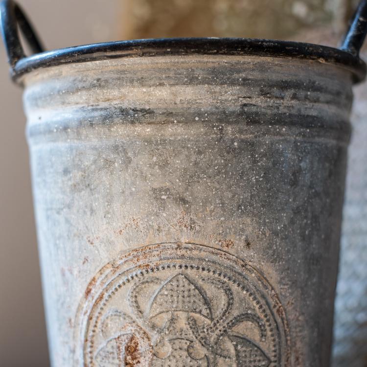 Antique Floral Carving Iron Flower Pot in gray with intricate floral designs, available in three sizes.