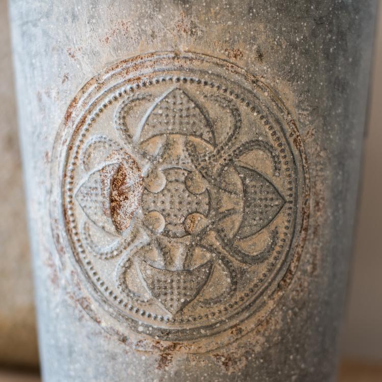 Antique Floral Carving Iron Flower Pot in gray with intricate floral designs, available in three sizes.