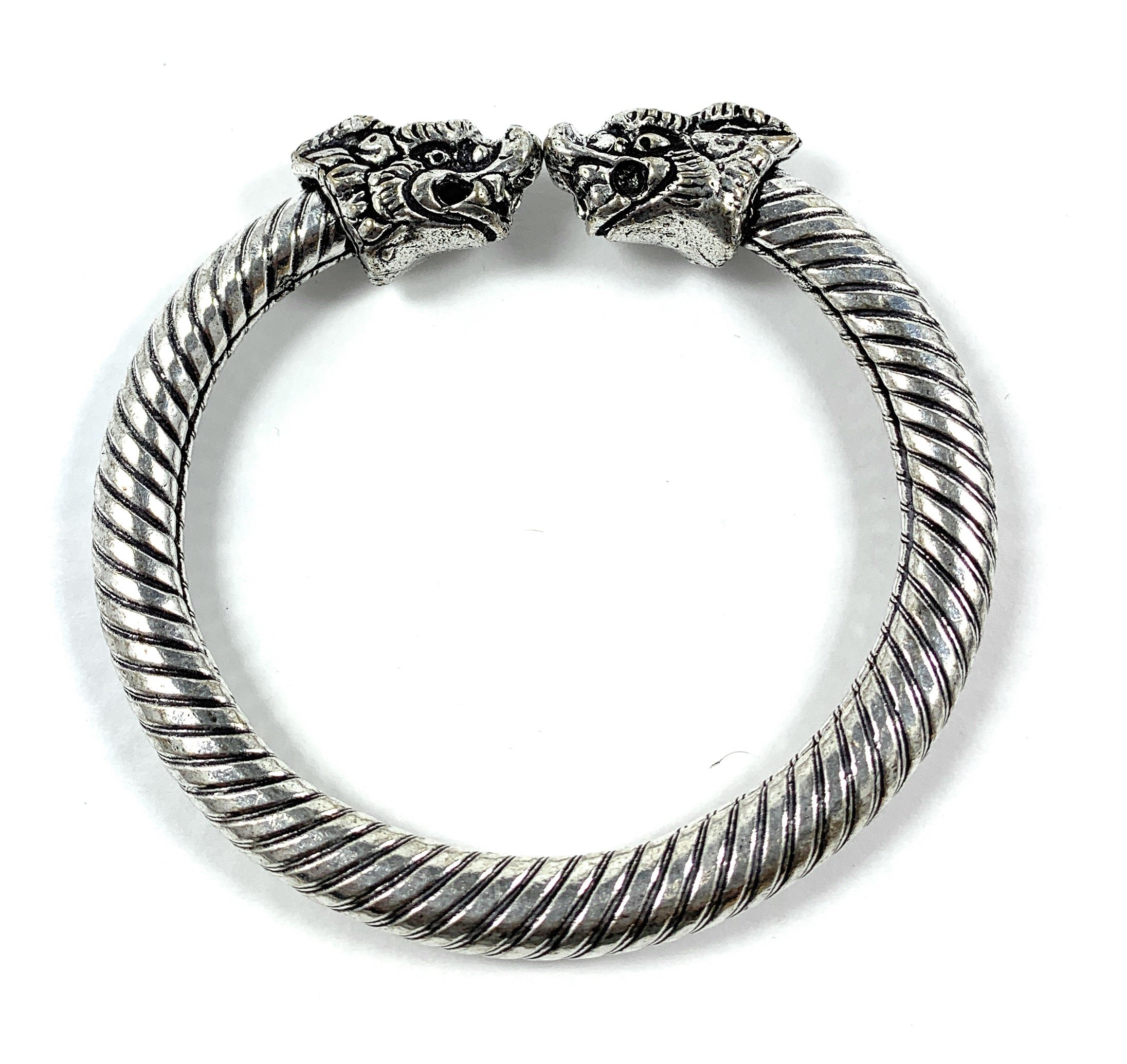 Antique Norse Viking Bracelet featuring intricate dragon heads, showcasing vintage craftsmanship and design.