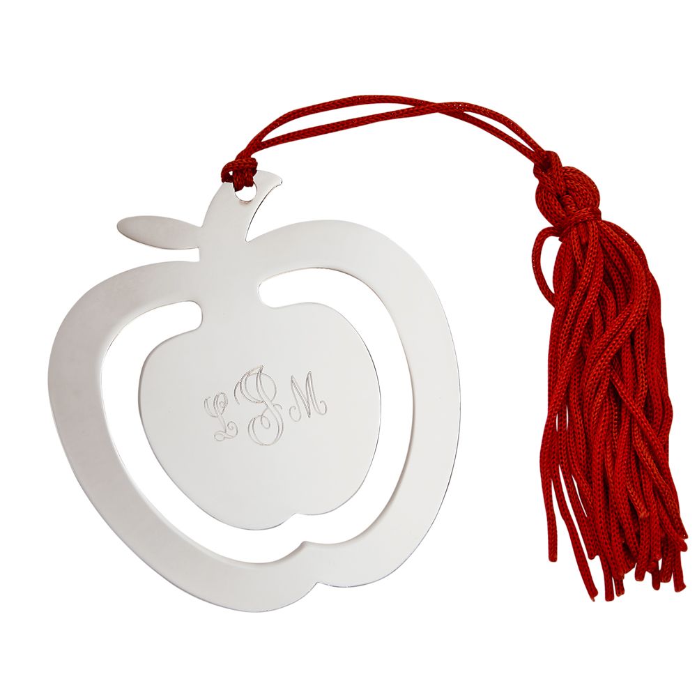 An elegant apple shaped bookmark with a red tassel, beautifully gift boxed.