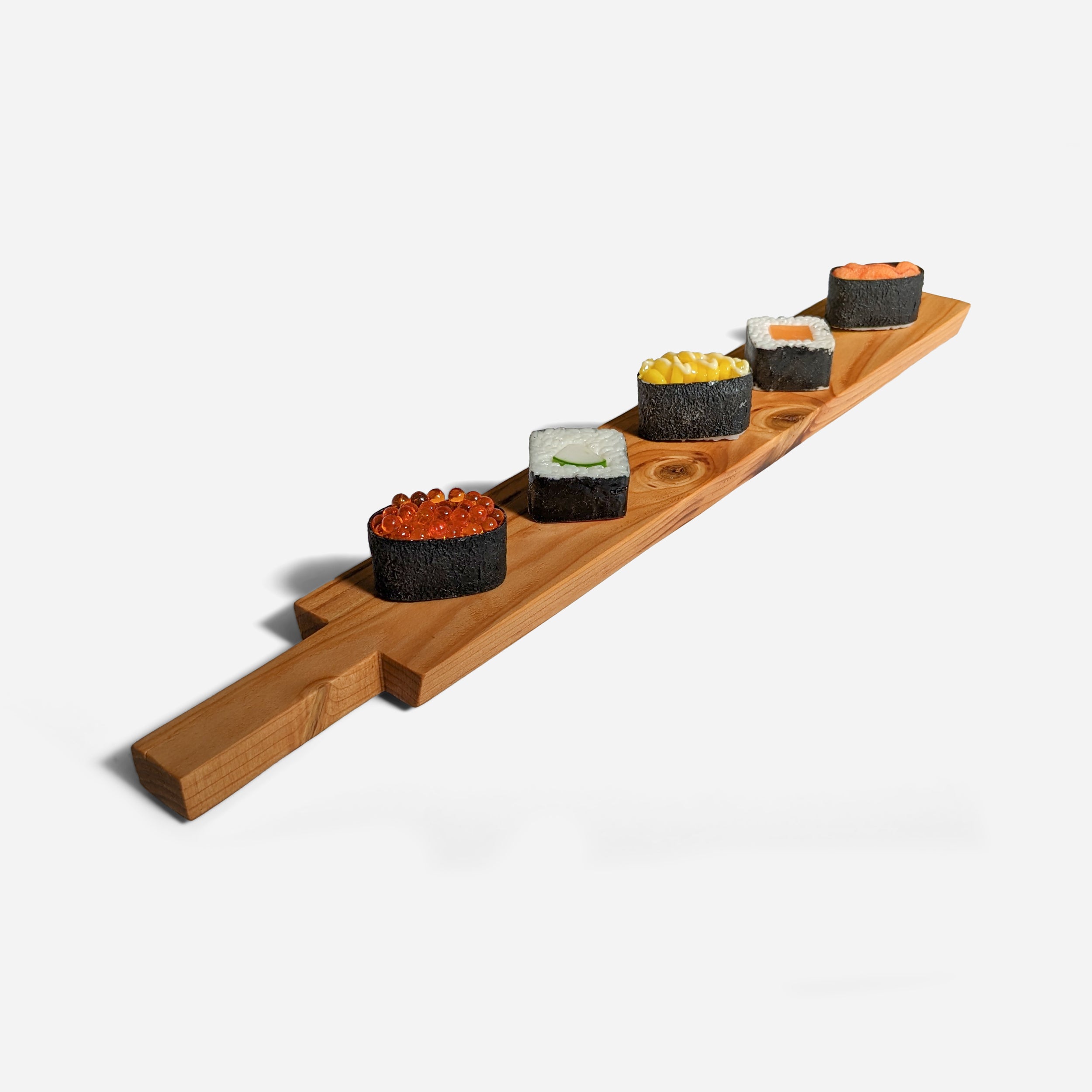 Appy charcuterie board with built-in handle, showcasing natural wood grain and sleek design, perfect for serving appetizers.