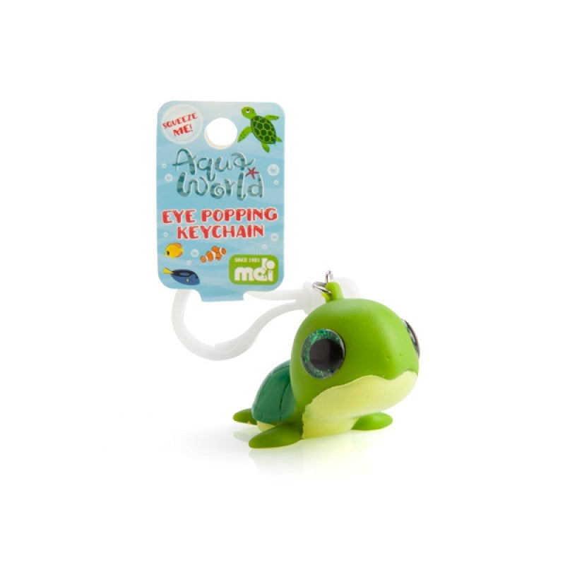 Aqua World Eye Popping Keychain featuring a green turtle with big sparkly eyes that pop out when squished, showcasing its cute and quirky design.