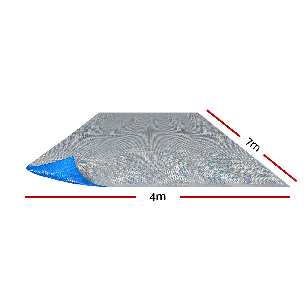 Aquabuddy Solar Swimming Pool Cover measuring 7m x 4m, featuring a blue top and silver underside for optimal heat retention.