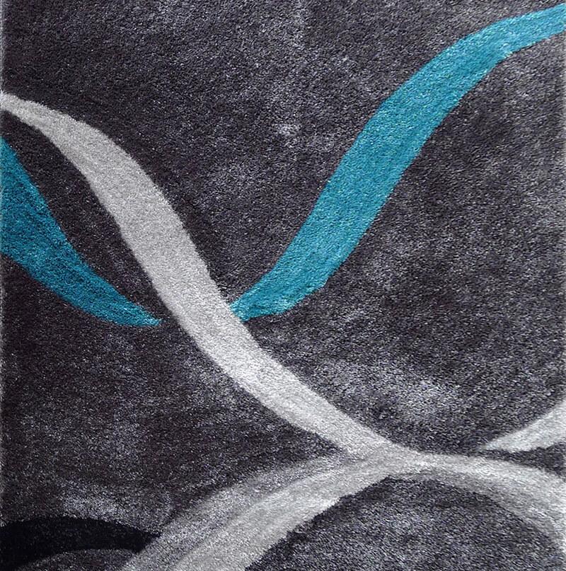 Aria Gray, Turquoise & Silver Soft Pile Shaggy Area Rug showcasing its plush texture and modern color palette.