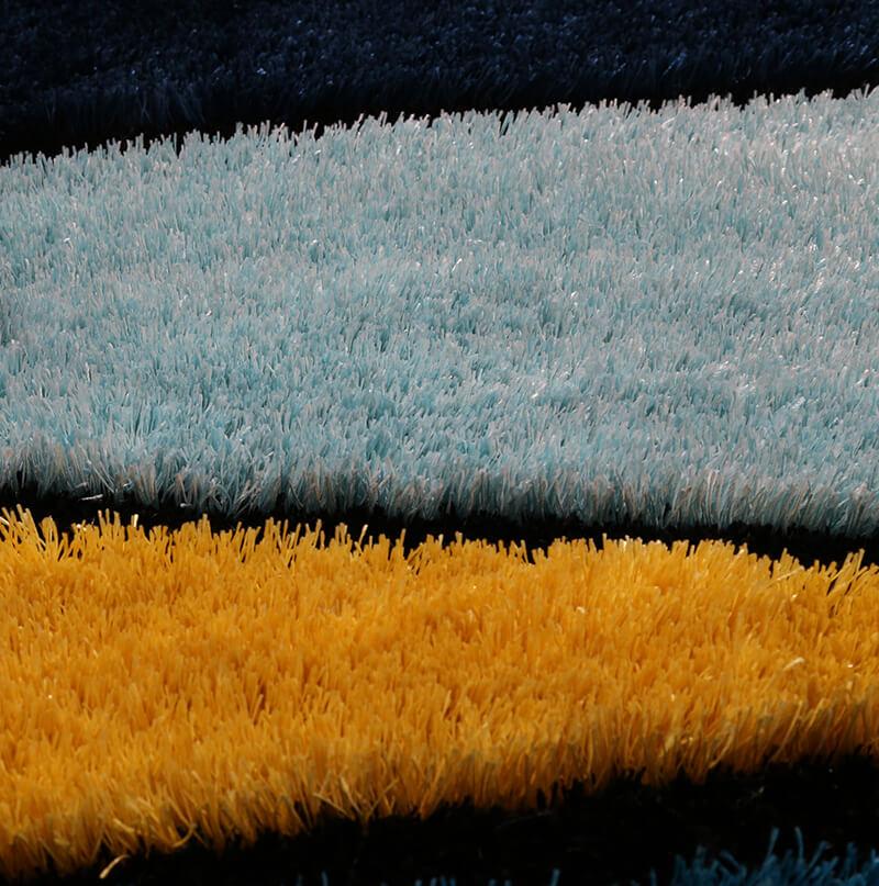 Aria Yellow and Blue Shag Area Rug showcasing soft shag texture and vibrant colors, perfect for modern home decor.