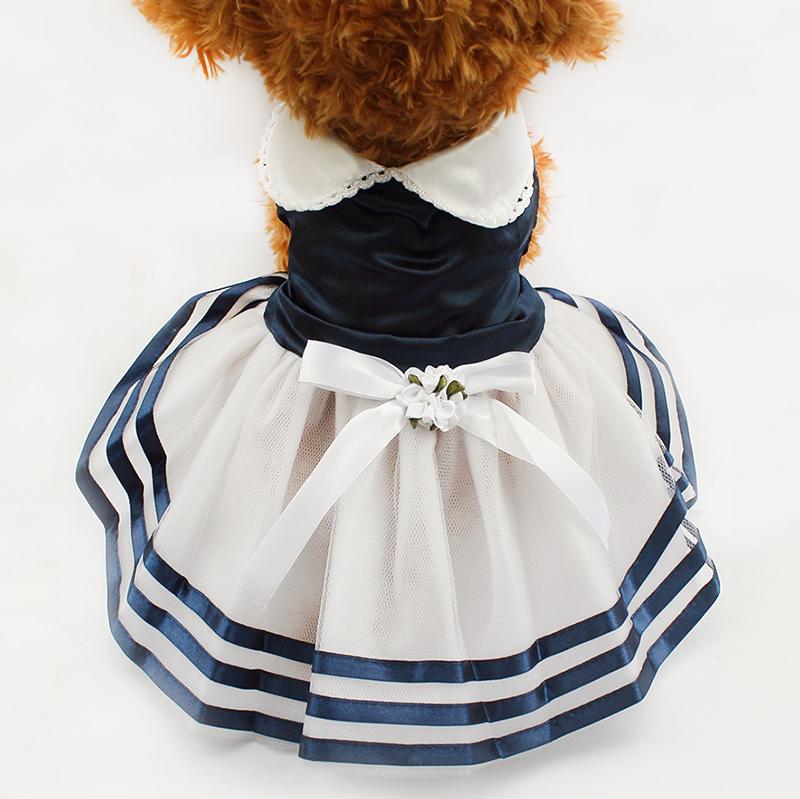 A vibrant red and blue Tutu Lace Sailor Dog Dress featuring floral patterns, perfect for stylish pets.