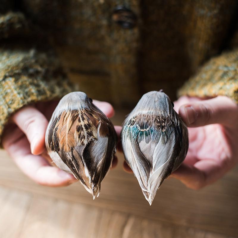 Set of 3 realistic artificial bird ornaments made from natural feathers and mixed materials, showcasing various colors.