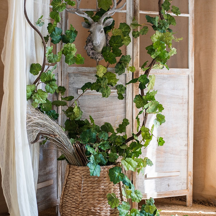 A long, lush artificial coral bells plant vine, 71 inches in length, featuring vibrant green leaves and delicate blooms, perfect for home decor.