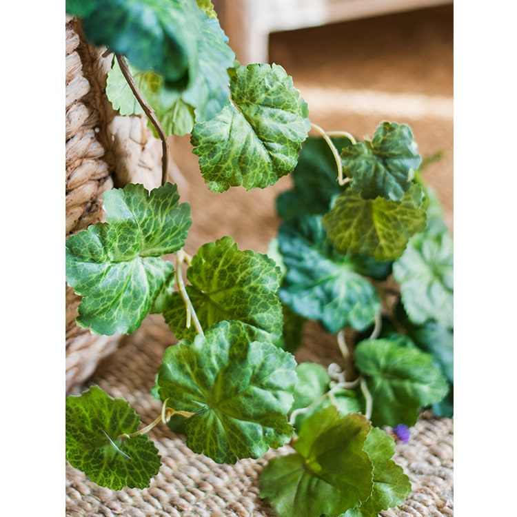 A long, lush artificial coral bells plant vine, 71 inches in length, featuring vibrant green leaves and delicate blooms, perfect for home decor.