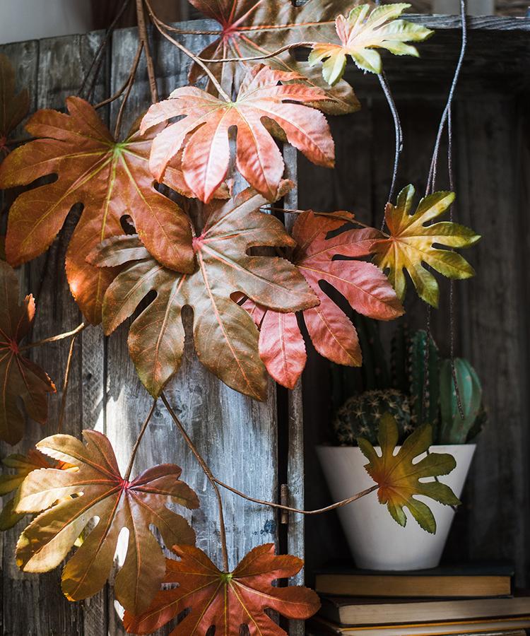 32-inch tall Artificial Fatsia Leaf in vibrant autumn red, showcasing realistic leaves and mixed colors, perfect for home decor.