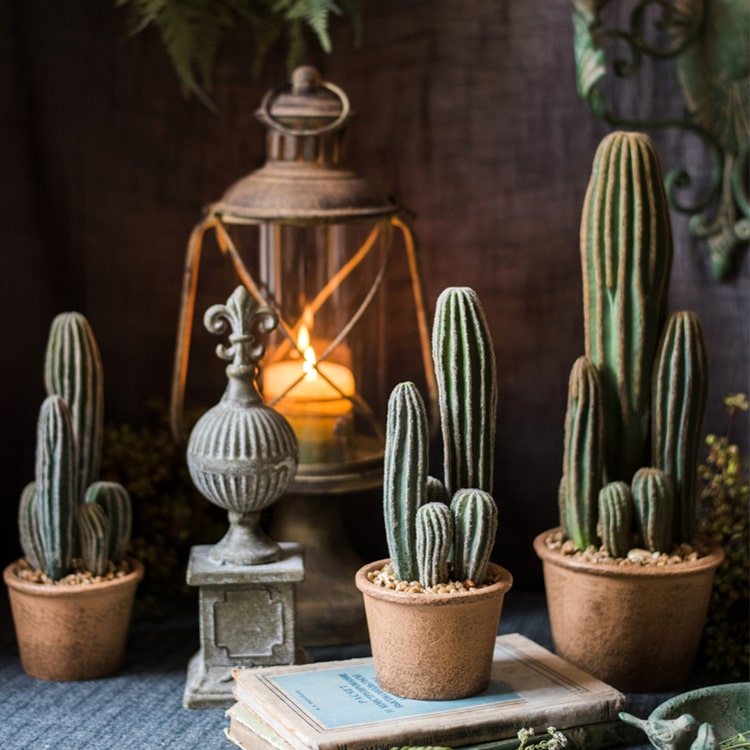 Artificial faux cactus in a brown pot, showcasing realistic green textures and earthy tones, perfect for home or office decor.