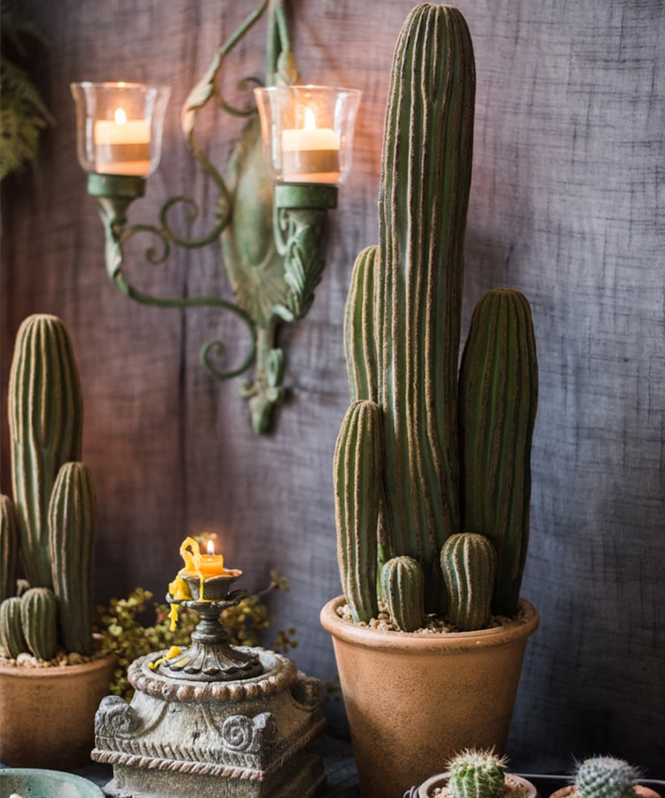 Artificial faux cactus in a brown pot, showcasing realistic green textures and earthy tones, perfect for home or office decor.