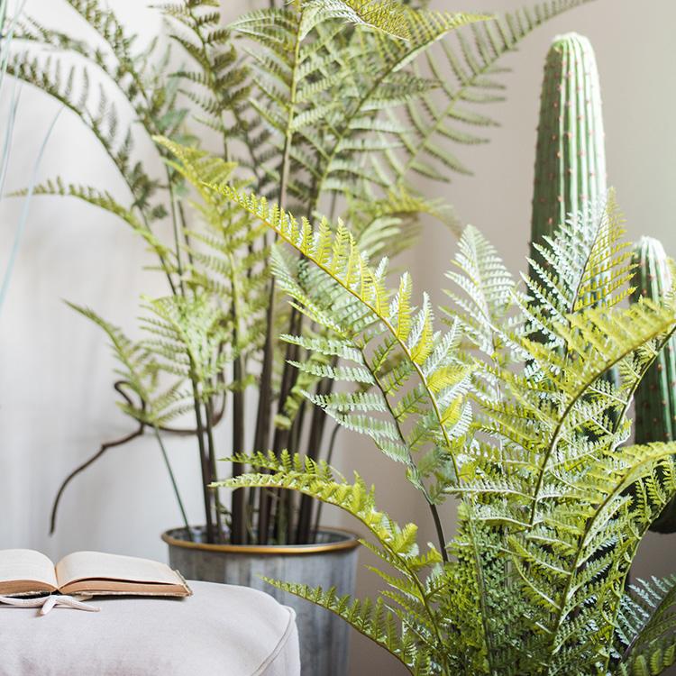 A realistic Artificial Faux Cyathea Tree in a decorative pot, showcasing lush green leaves and a sturdy base, perfect for home decor.