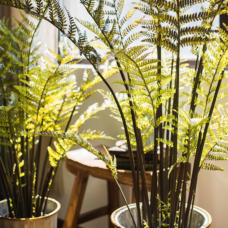 A realistic Artificial Faux Cyathea Tree in a decorative pot, showcasing lush green leaves and a sturdy base, perfect for home decor.