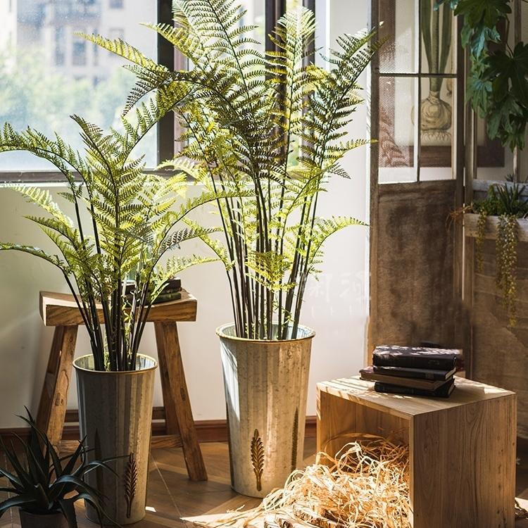 A realistic Artificial Faux Cyathea Tree in a decorative pot, showcasing lush green leaves and a sturdy base, perfect for home decor.