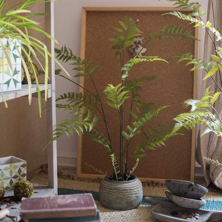 Artificial Faux Eagle Fern Bulk Plant in vibrant green with a sturdy black base, showcasing realistic leaves and textures.