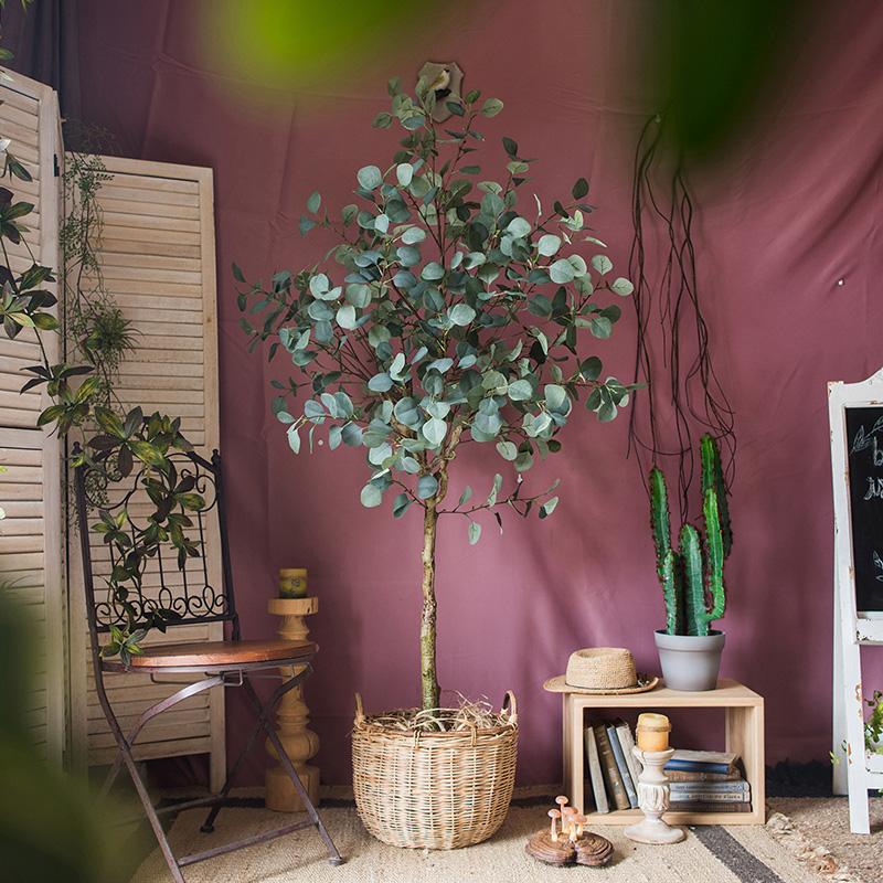 Artificial Faux Eucalyptus Tree in a black pot, showcasing realistic green leaves and a stylish design for home decor.