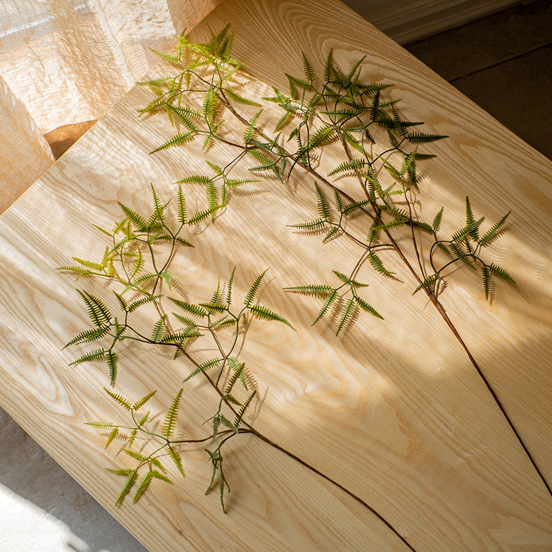 Artificial Faux Forked Fern Stem in vibrant green color, showcasing realistic leaves and available in two sizes.