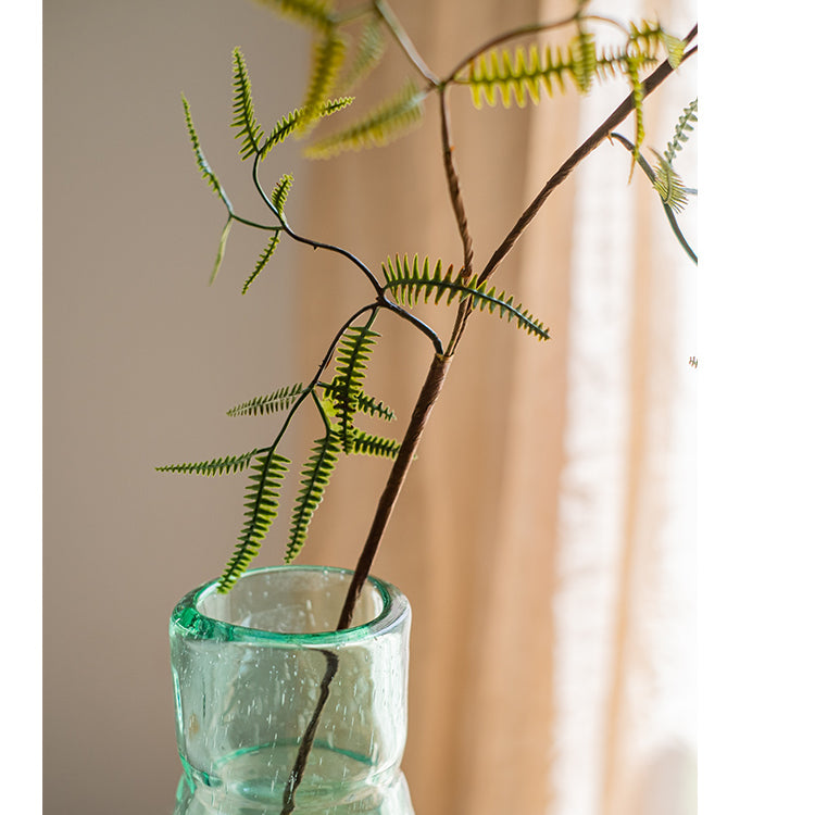 Artificial Faux Forked Fern Stem in vibrant green color, showcasing realistic leaves and available in two sizes.