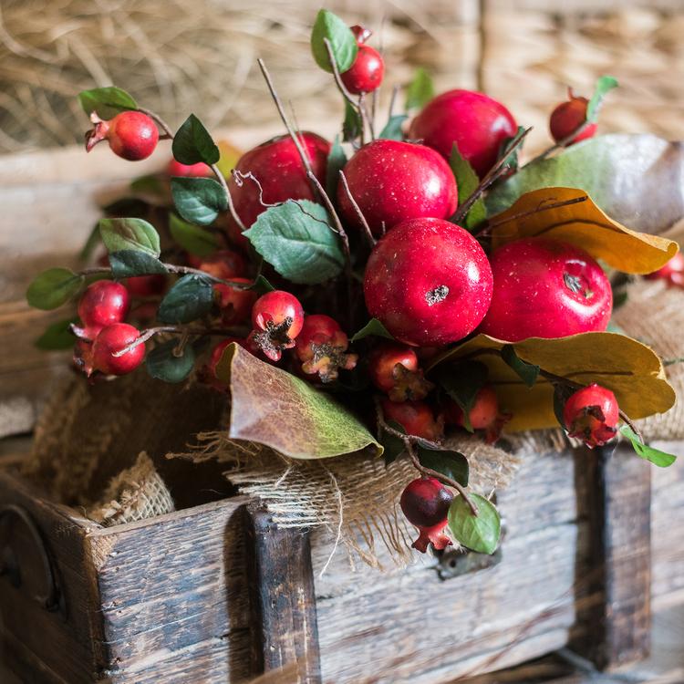 A vibrant 12-inch tall artificial bouquet featuring faux apples and pomegranates in red and green colors, perfect for home decor.