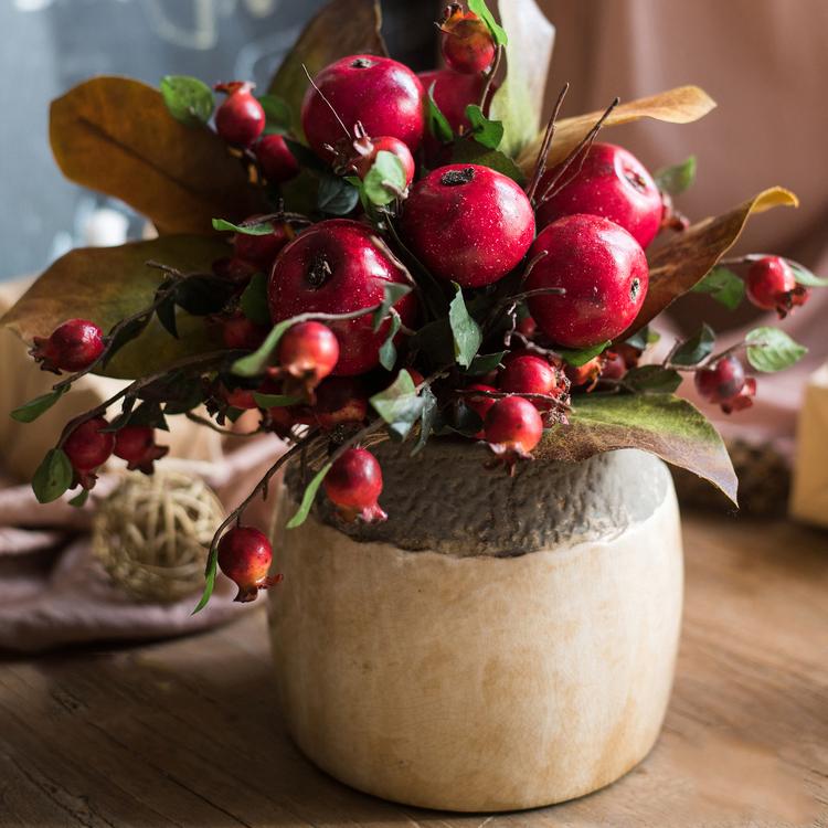 A vibrant 12-inch tall artificial bouquet featuring faux apples and pomegranates in red and green colors, perfect for home decor.