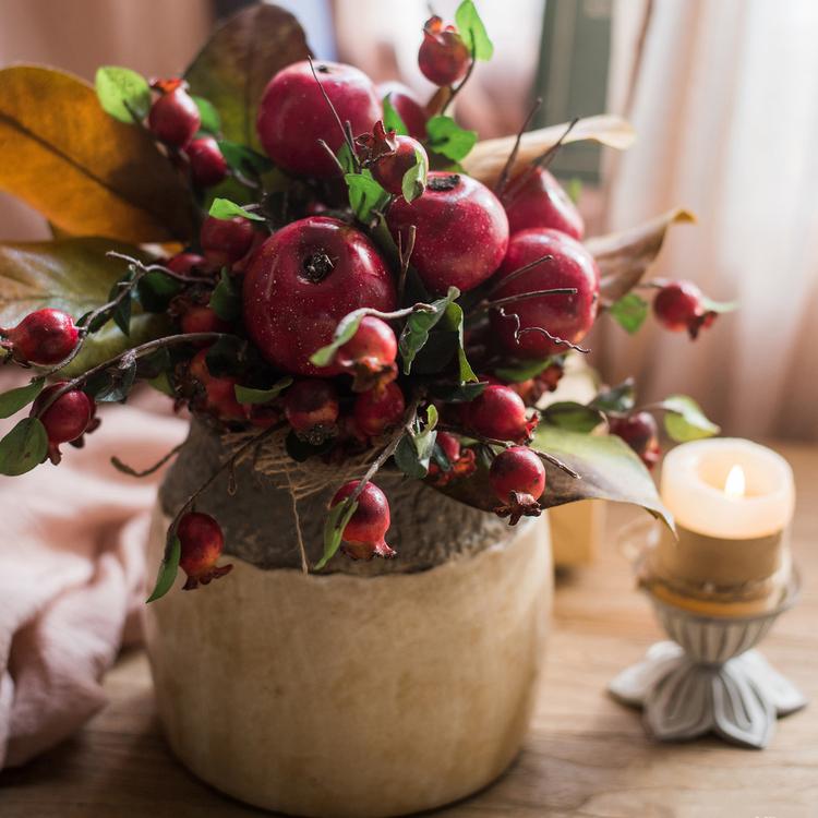 A vibrant 12-inch tall artificial bouquet featuring faux apples and pomegranates in red and green colors, perfect for home decor.