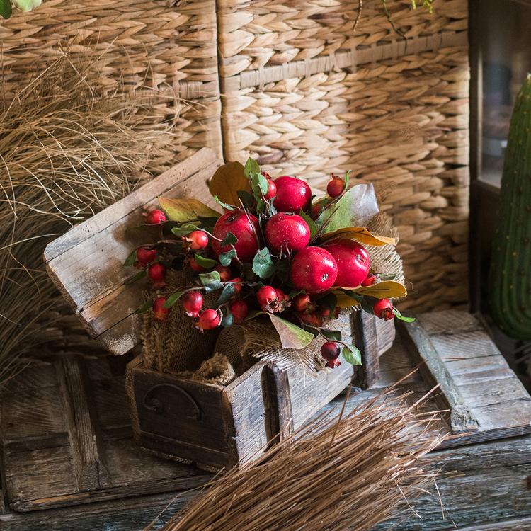 A vibrant 12-inch tall artificial bouquet featuring faux apples and pomegranates in red and green colors, perfect for home decor.