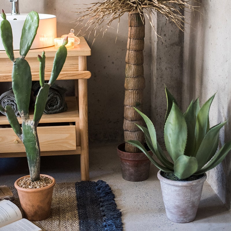 A large, realistic artificial agave plant in a gray pot, measuring 22.8 inches tall, showcasing vibrant green leaves.